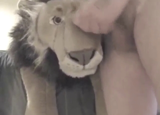 Plushie lion takes a facial after this hard fuck